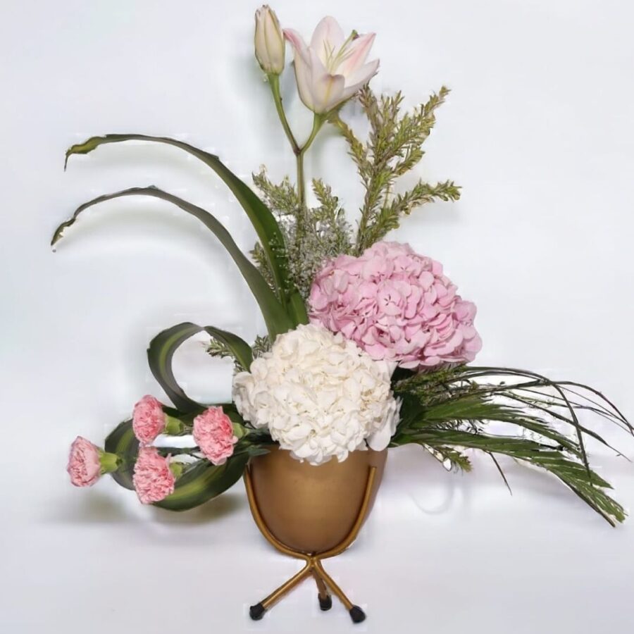 PINK ORIENTAL LILY AND PINK CARNATIONS.