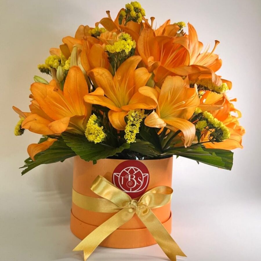YELLOW STATICE IN ORANGE BOUQUET BOX.