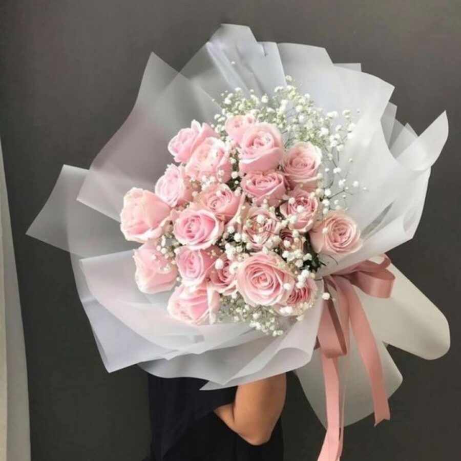 DELICACY OF PINK ROSES A HAND TIED BOUQUET